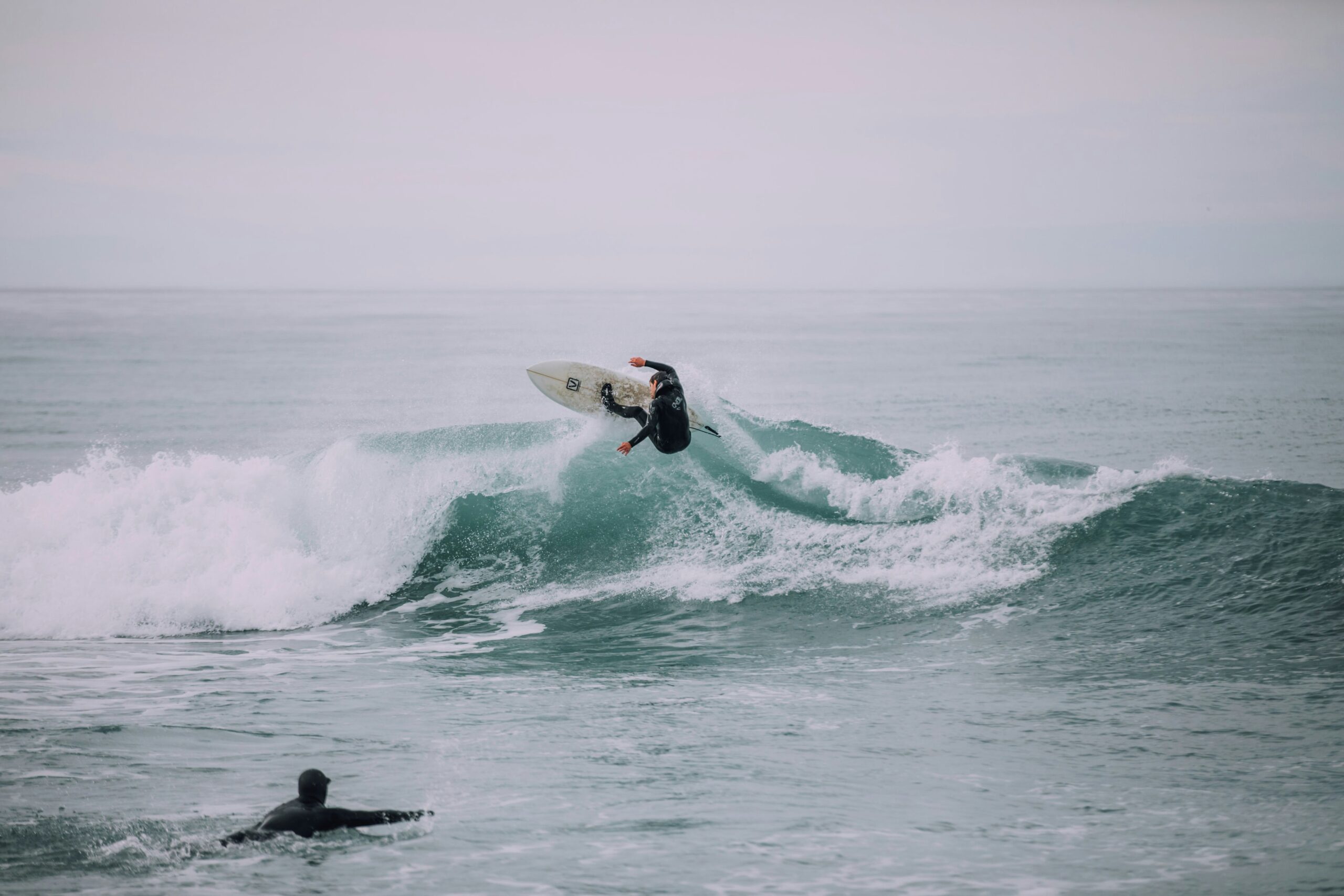 Surfing a wave in off the shore in North Goa. Source: Unsplash Surfing a wave in off the shore in North Goa. Source: Unsplash